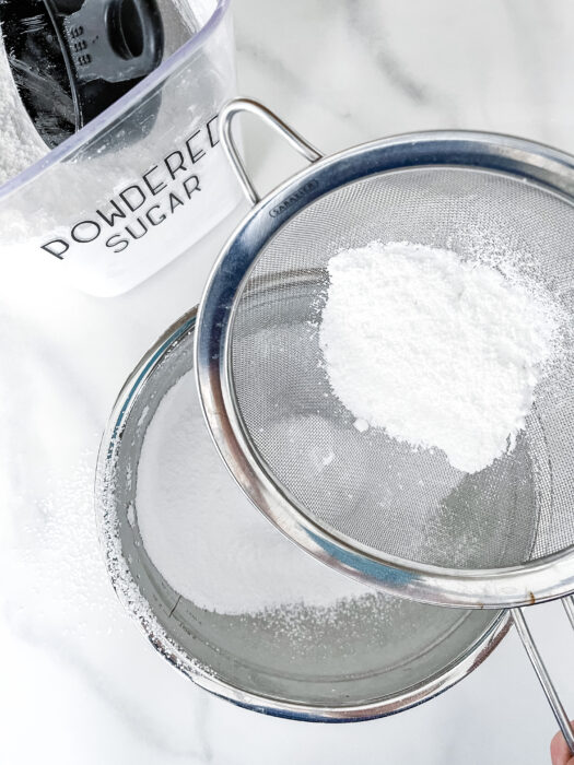 Sifting Powdered Sugar into a Bowl