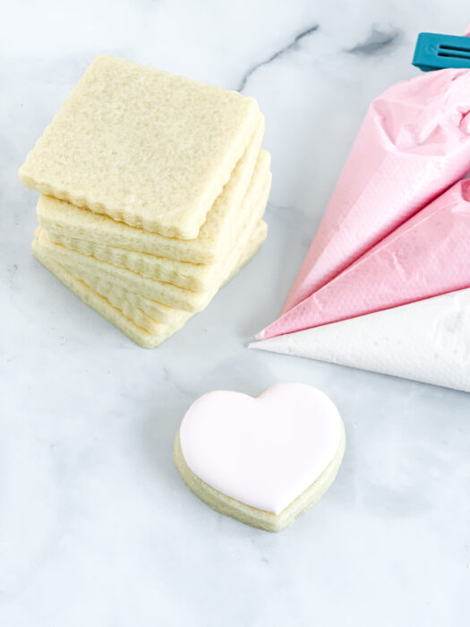 Cut out Cookies on Counter with Royal Icing