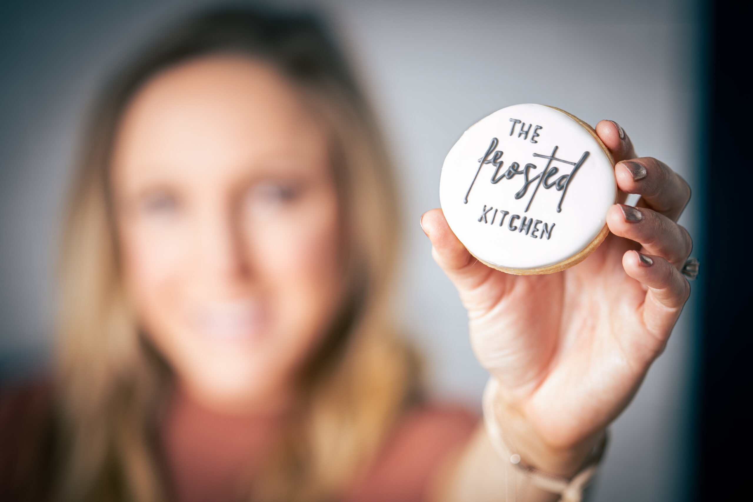 The Frosted Kitchen Logo on a Royal Icing Cookie