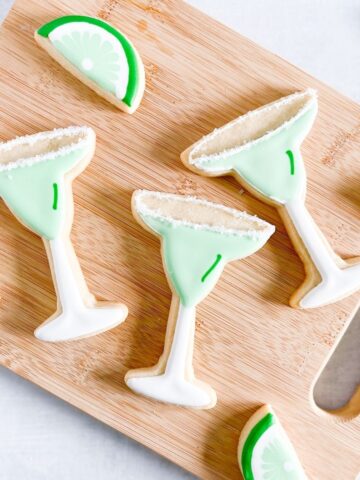 margarita decorated sugar cookies on a tray