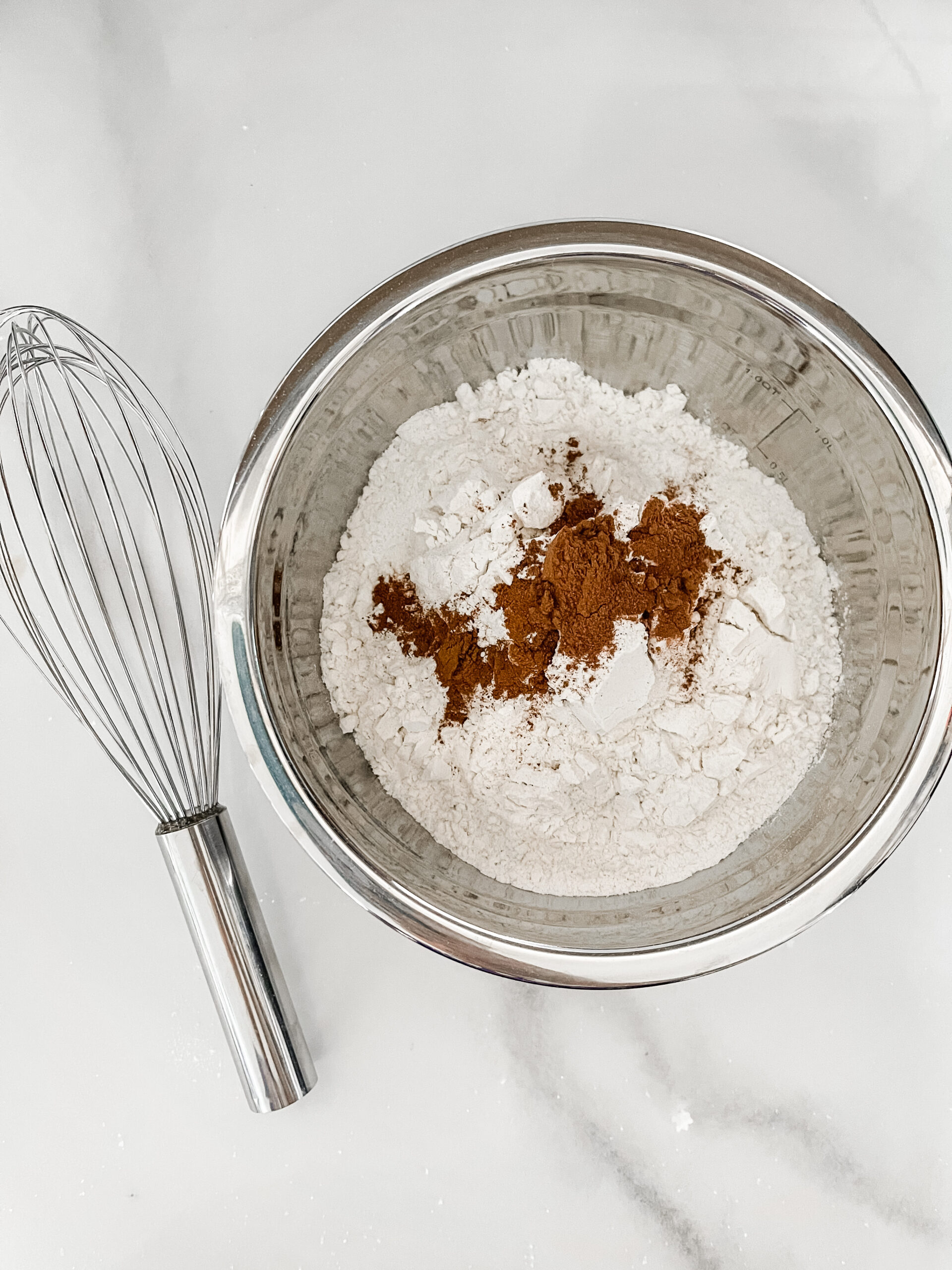 flour, cinnamon, and pumpkin spice in a bowl