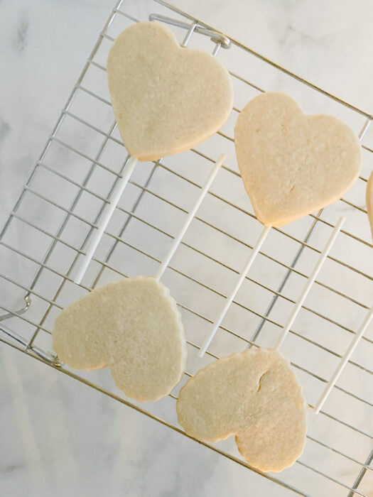 sugar cookie pops cooling on rack