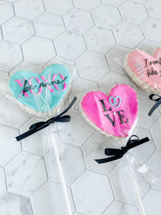 packaged cookie pops tied with ribbon