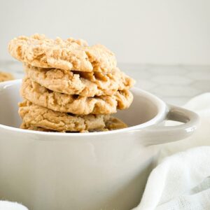 stack of peanut butter cookies in a mug