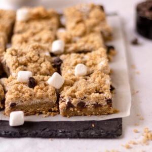 cut up s'mores bars on a piece of parchment paper