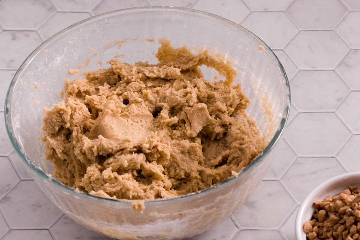 Cookie dough in a clear bowl.