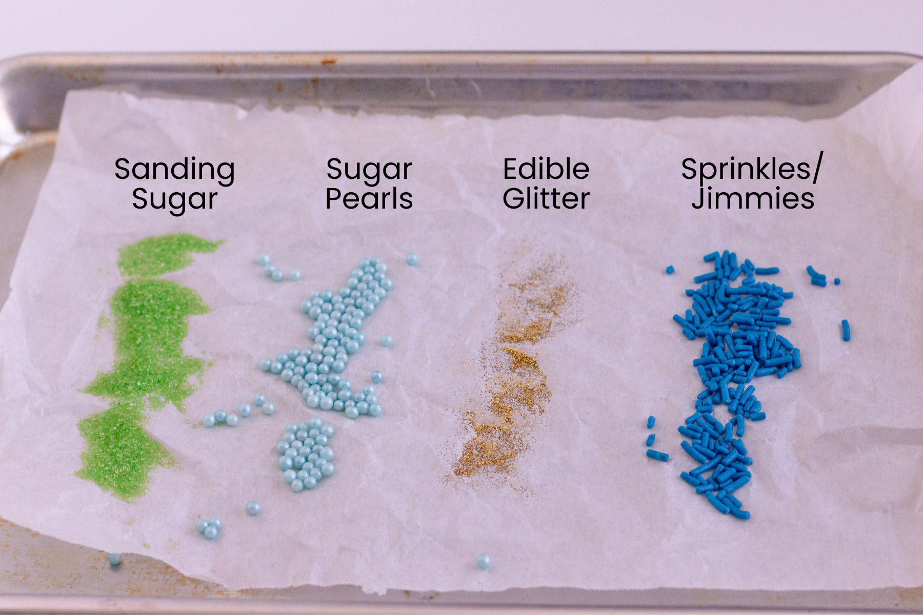 Examples of Sanding Sugar, Sugar Pearls, Edible Glitter, and Jimmies