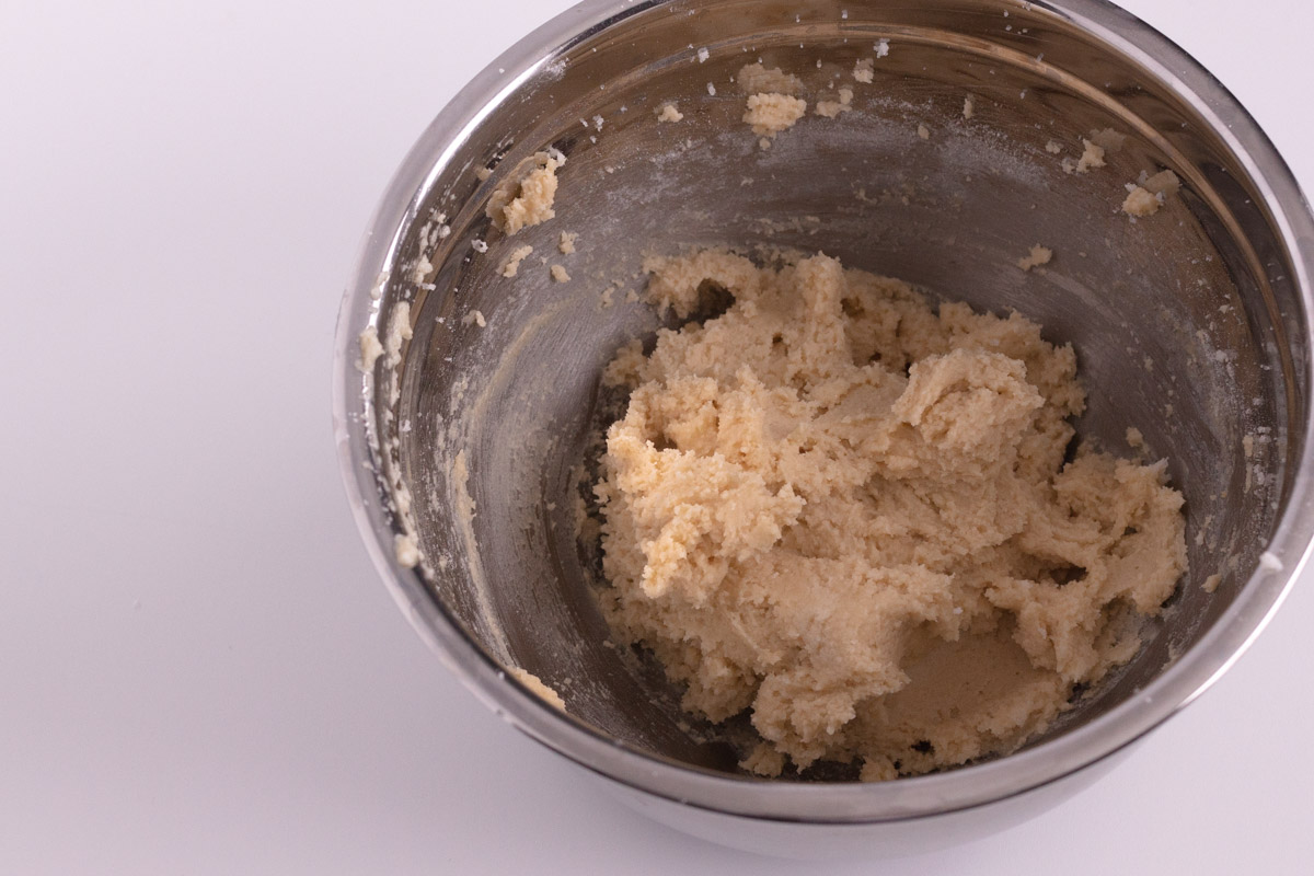 Dough in a bowl after mixing the dry ingredients into the wet ingredients.