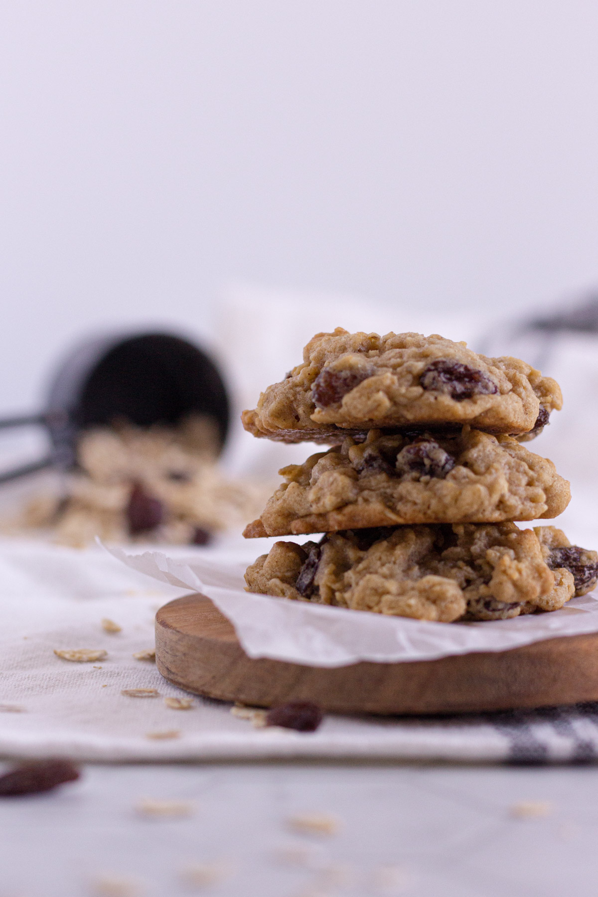 3 oatmeal raisin cookies stacked up together.