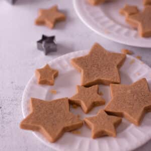 Star cut out cookies on a plate.