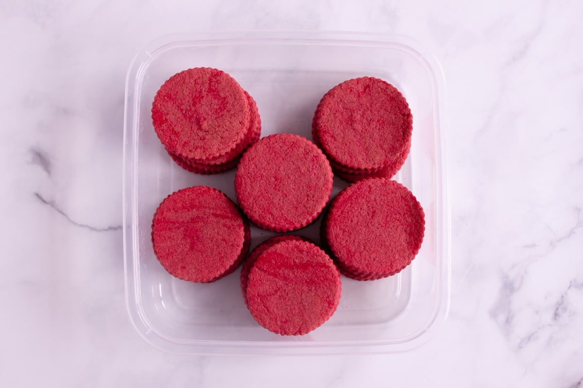 Undecorated cookies in a container. 