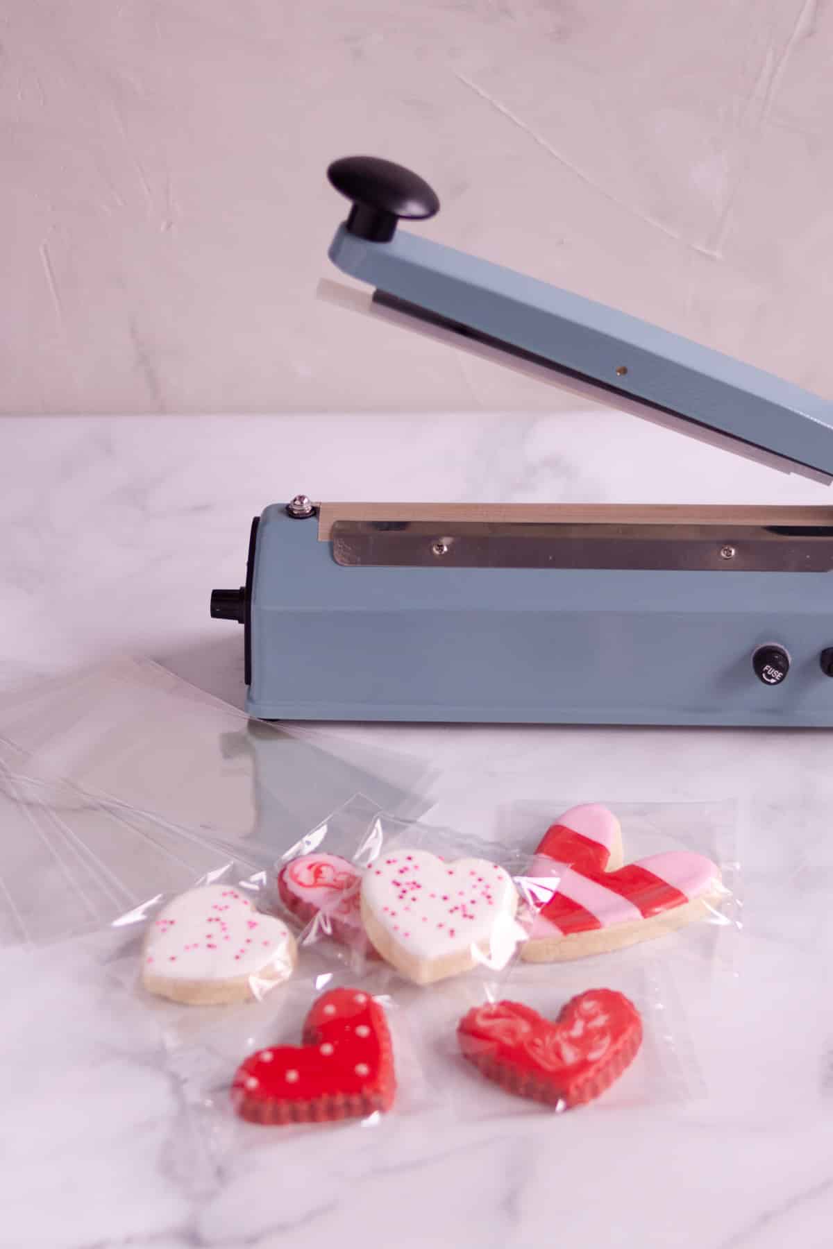 Heat sealer with bags and sealed cookies. 