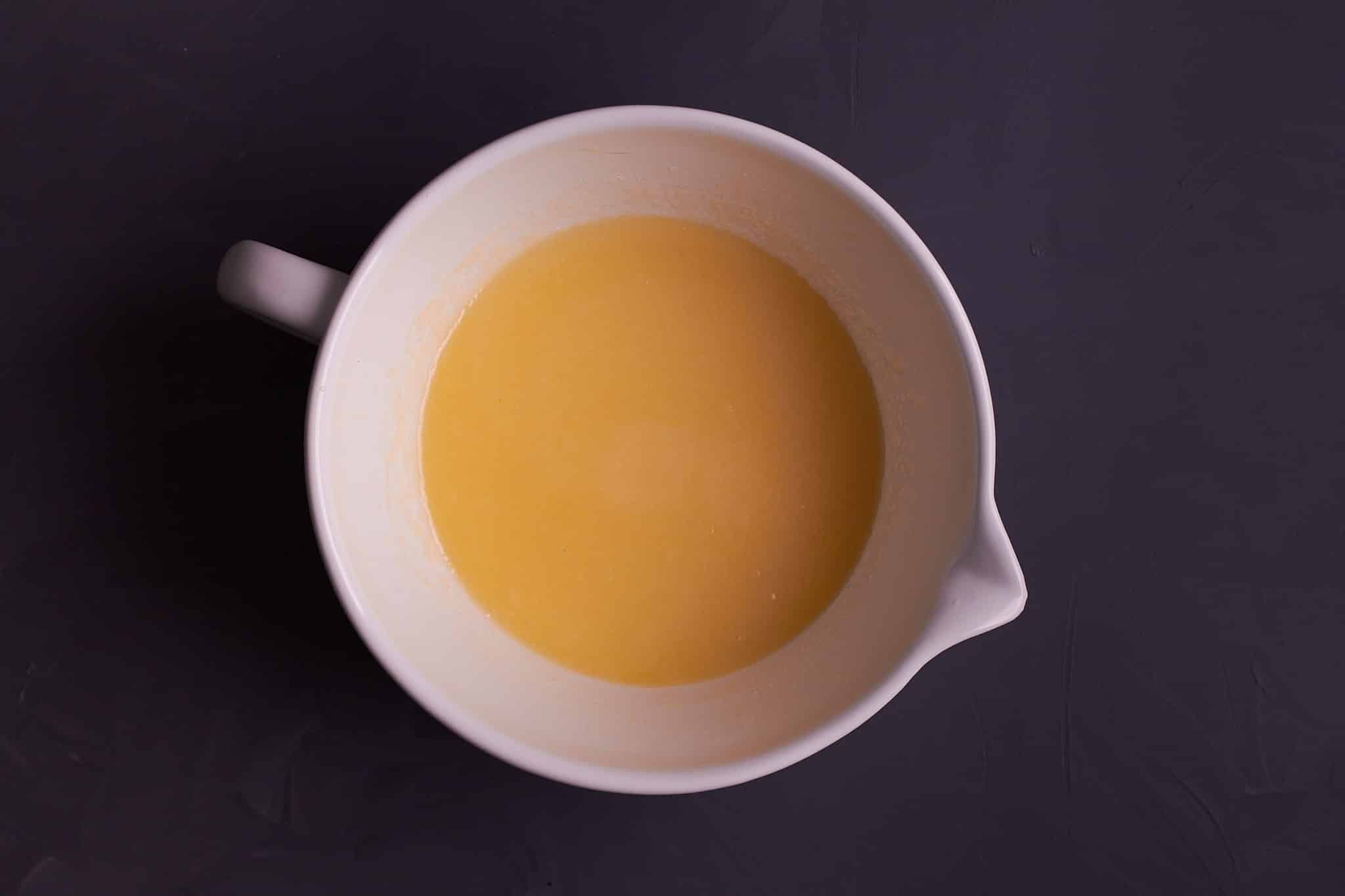 Butter and sugar mixed together in large bowl. 